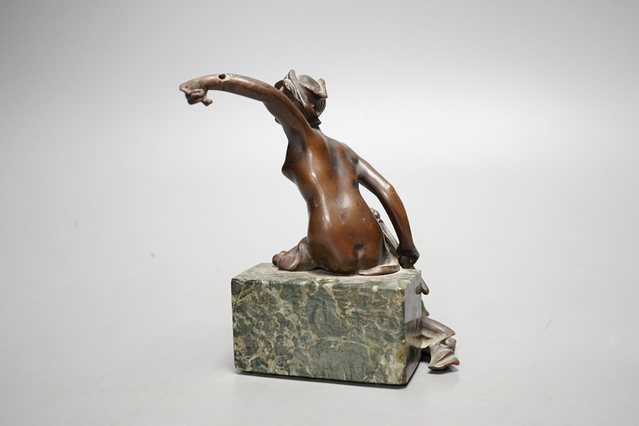 An Art Deco bronze semi-nude seated female, 13 cms high.